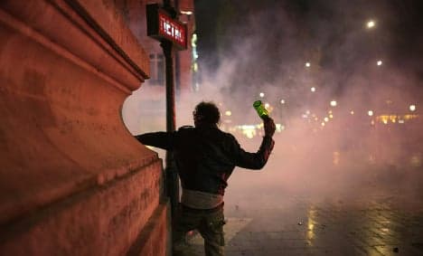 Dozens more held after violent clashes in Paris
