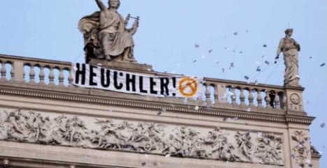 Austrian extremists scale theatre roof in latest protest