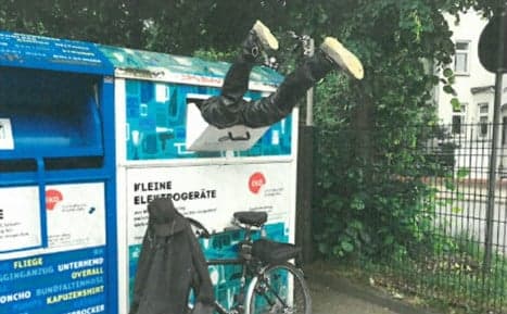Puzzled cops pull pair of legs out of bin for second time