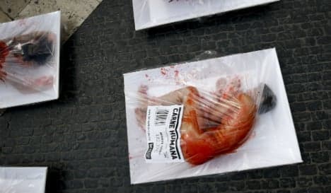 Vegans get naked and bloody at Barcelona anti-meat protest