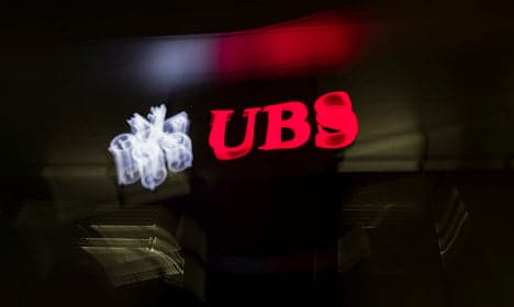 UBS share price tumbles on lower profit result