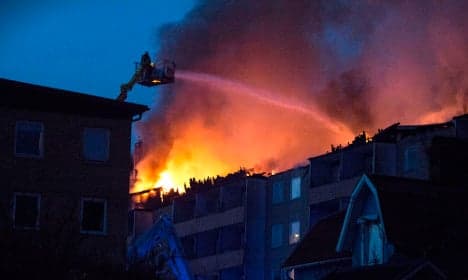 Fire rips through apartment block, 157 homes evacuated