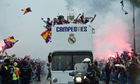 Real Madrid come home to ecstatic crowds in capital