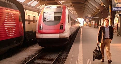 Suspected arson attack closes train line to Zurich airport