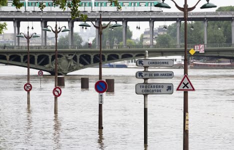 Paris floods: Museums and train lines close as Seine rises