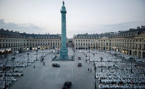 In Images: Paris hosts world's poshest flash mob picnic