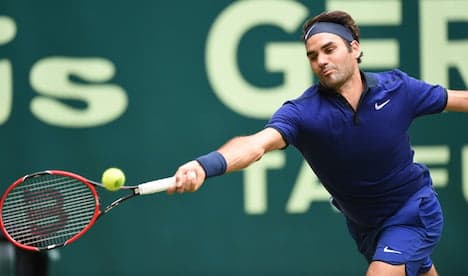 Federer ousts Goffin to reach Halle semis