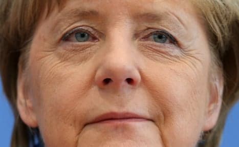 After rampages, Merkel says again: Wir schaffen das