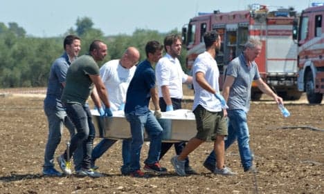 Puglia train collision: mourners identify the dead