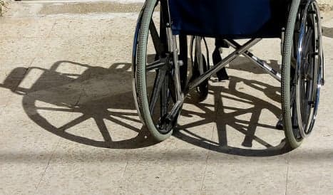 Watch: Man in wheelchair zooms past Barcelona traffic