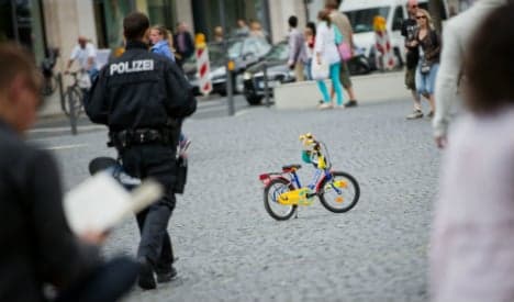 Policeman uses kiddie's bike to hunt down drunk fugitive