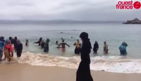 Bretons bathe fully clothed as Muslim asked to leave beach