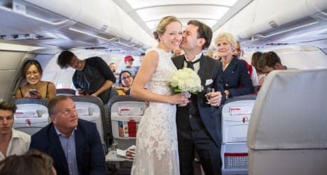 Couple get hitched on plane in surprise wedding ceremony