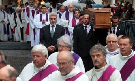 Thousands gather to mourn murdered French priest