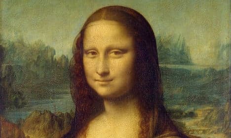 French banned from 'Mona Lisa smile' on photo IDs