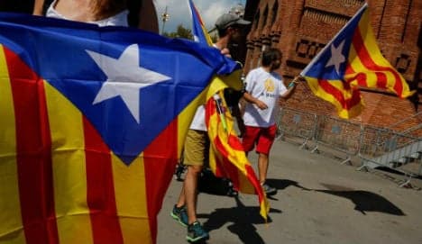 Catalans rally on La Diada to push for break from Spain