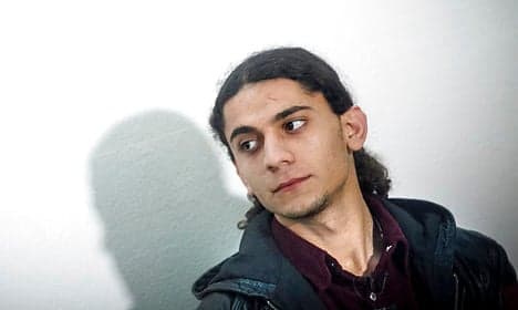 Denmark's rebel poet Hassan gets prison for shooting