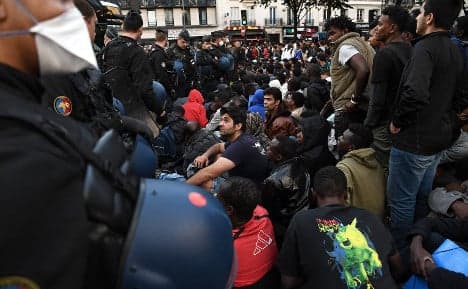 Paris police clear 1,500 migrants from makeshift camp