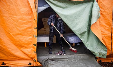 Denmark closes refugee tent camps as numbers drop