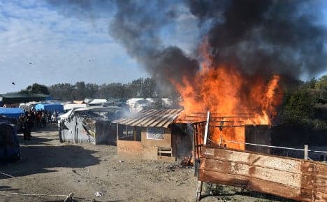 Jungle shacks set ablaze and torn down as camp razed