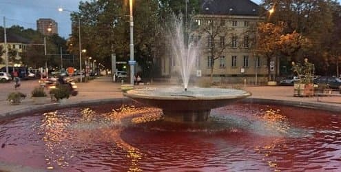 Tampon-tax protest turns Zurich fountains red