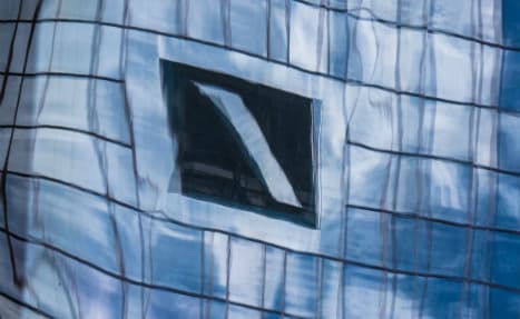Deutsche Bank reports surprise quarter billion profit