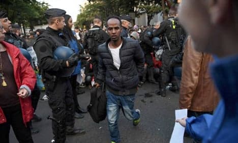 Police move in on swelling migrant camp in Paris