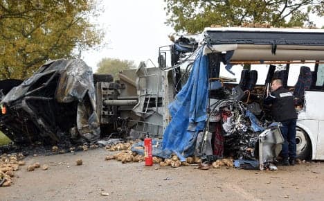 One dead after school bus collides with truck in France