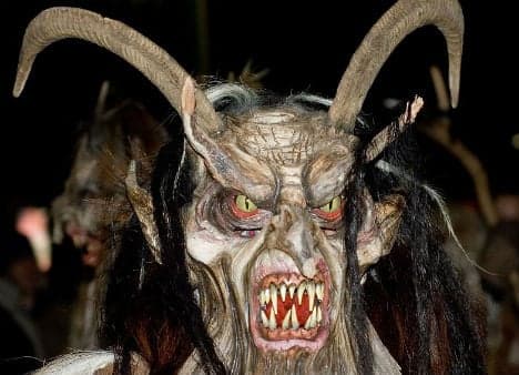 Krampus bursts into flames after procession