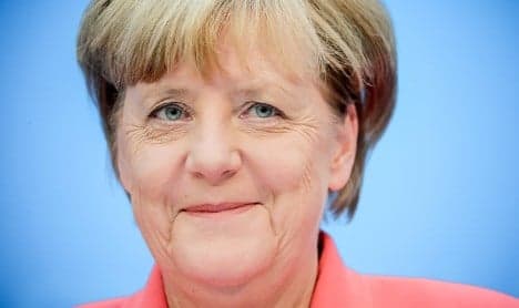 Merkel seeks new term ‘to defend democratic values’