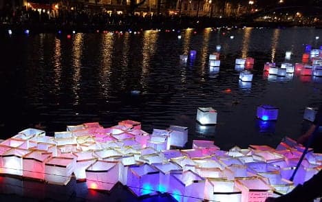 Paris remembers victims of terror with light and solidarity