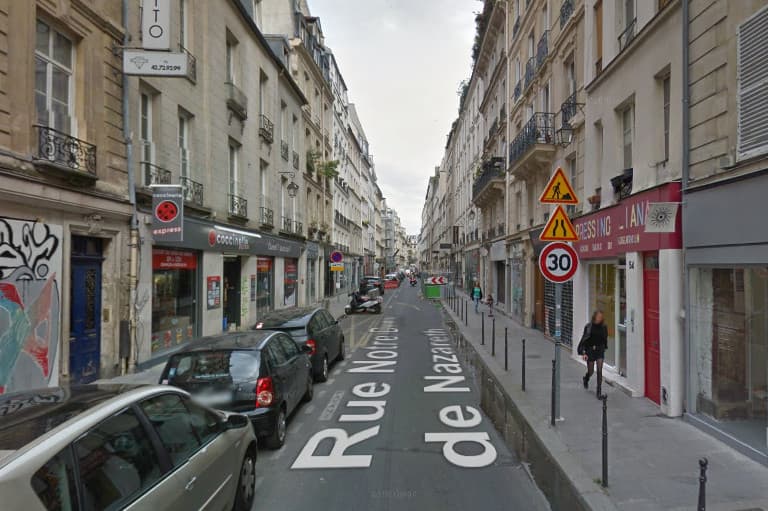 Chinese woman 'found stabbed to death' in central Paris flat
