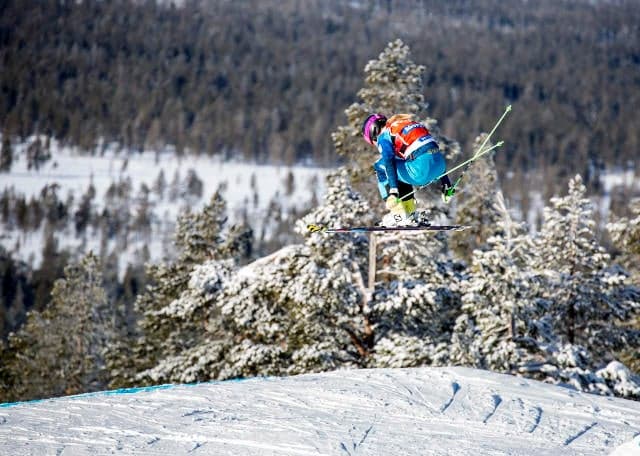 Swedish ski champion still in coma but 'improving'
