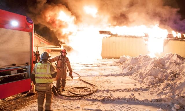 Fires claim woman's life and a school in two Norwegian towns