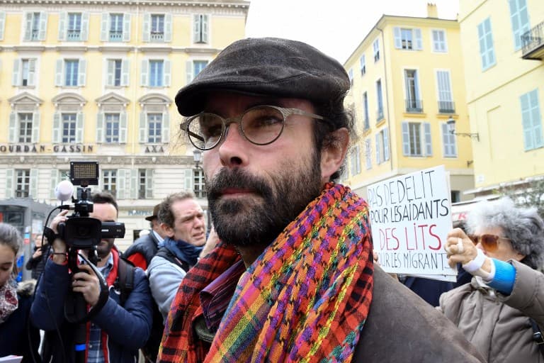 'Heroic' French farmer faces jail for helping migrants across Italian border