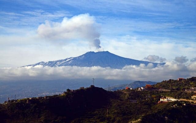 Schoolchildren evacuated as more than 60 quakes shake Mount Etna