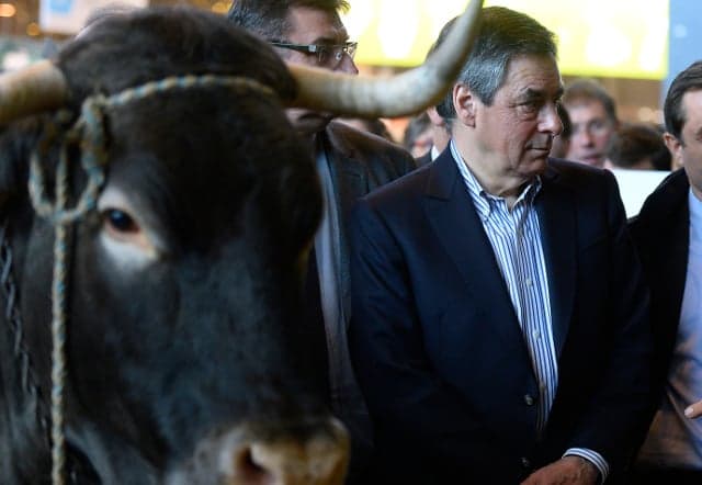 Fed-up farmers await presidential runners at Paris farm expo