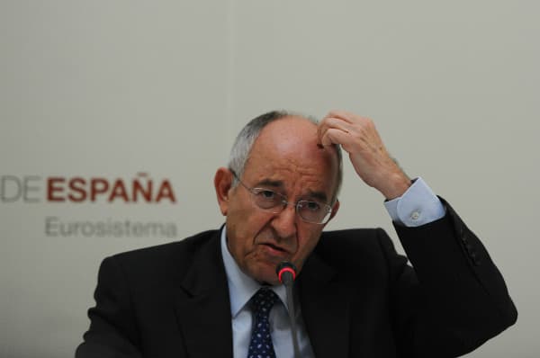 Ex-governor of Bank of Spain charged over banking scandal