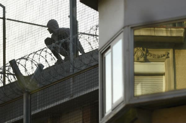 Prisoner stages 10 hour protest on roof of Barcelona jail