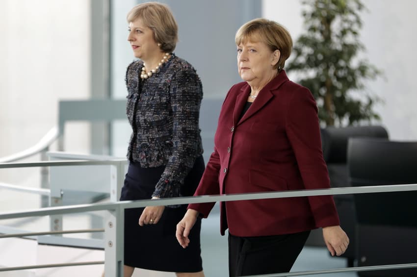 Merkel rejects May's call for parallel talks on EU-UK ties
