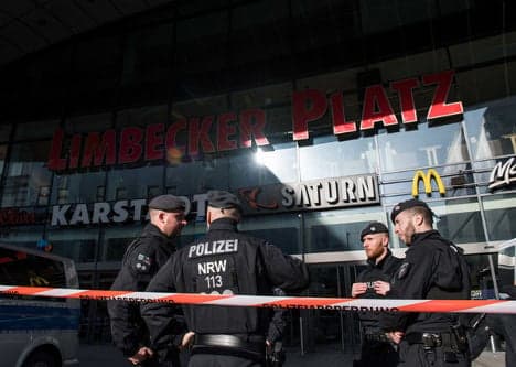 Germany frees one of two held over mall attack threat