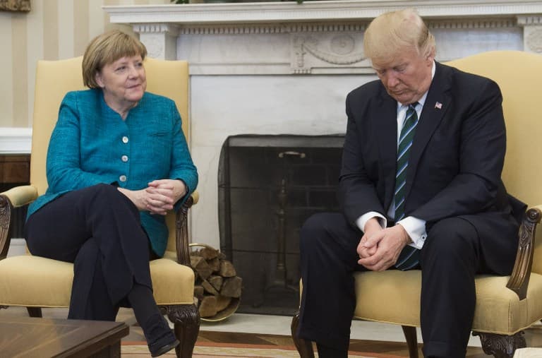 Tensions show as Trump and Merkel meet for first time