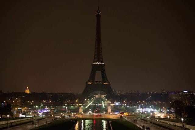 Paris consoles London as Iron Lady turns out lights in respect of victims