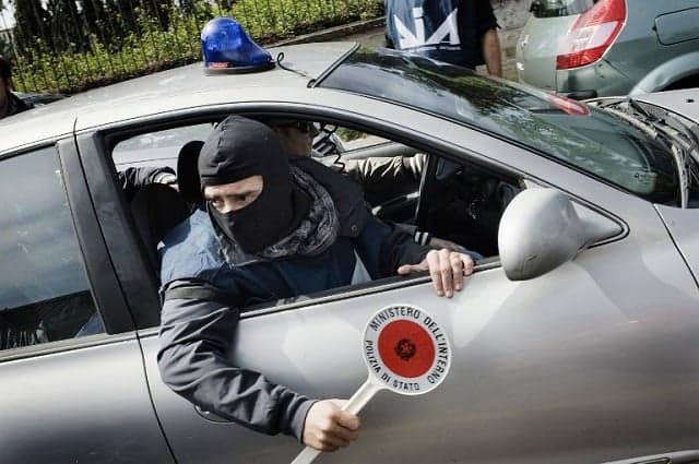 Naples police uncover mafia links to university, museum, and crematorium
