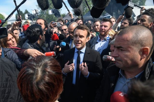 Emmanuel Macron finally wakes up in a factory car park in northern France