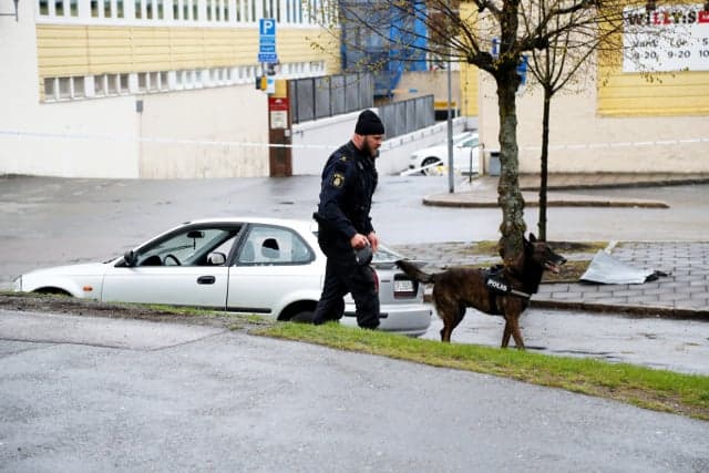 Police hunt masked shooters in Gothenburg