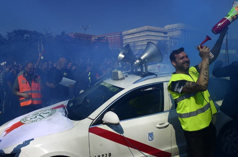 Spain's taxi drivers strike over Uber and Cabify