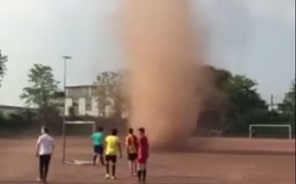 WATCH: Video of boy running through 'mini tornado' in Cologne goes viral