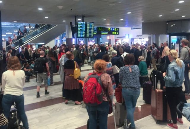 Midsummer holiday chaos leaves thousands of travellers stranded