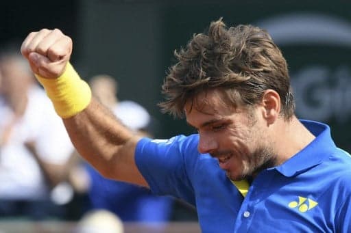 Wawrinka eases through to French Open quarterfinals